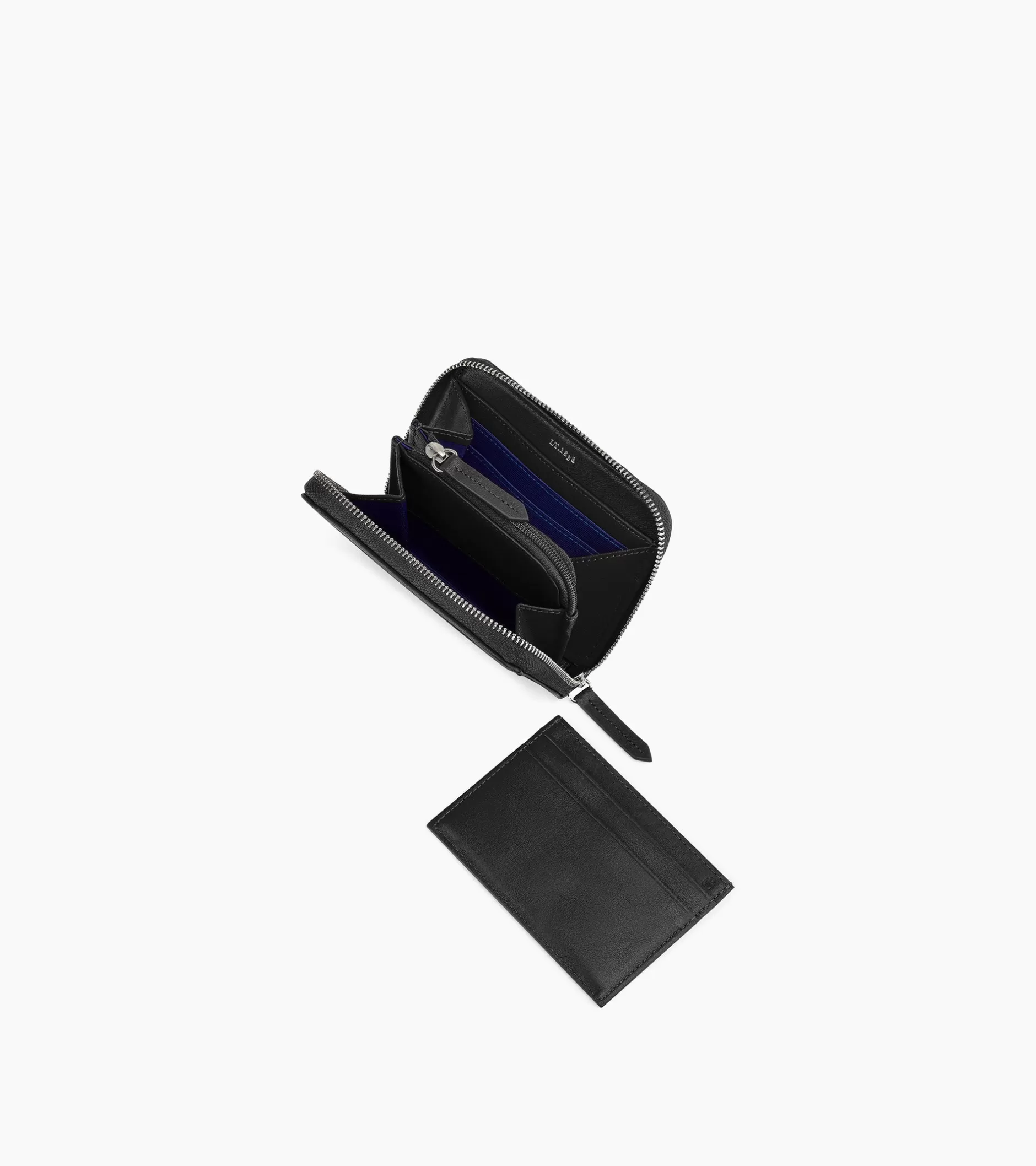 porte_monnaie_zipp_avec_porte_cartes_amovible_charlotte_en_cuir_lisse__black_3.webp Femme Le Tanneur Porte monnaie zippé avec porte cartes amovible Charlotte en cuir lisse - Black